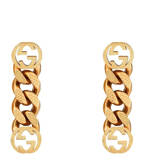 Gucci: Gold Interlocking G Earrings 